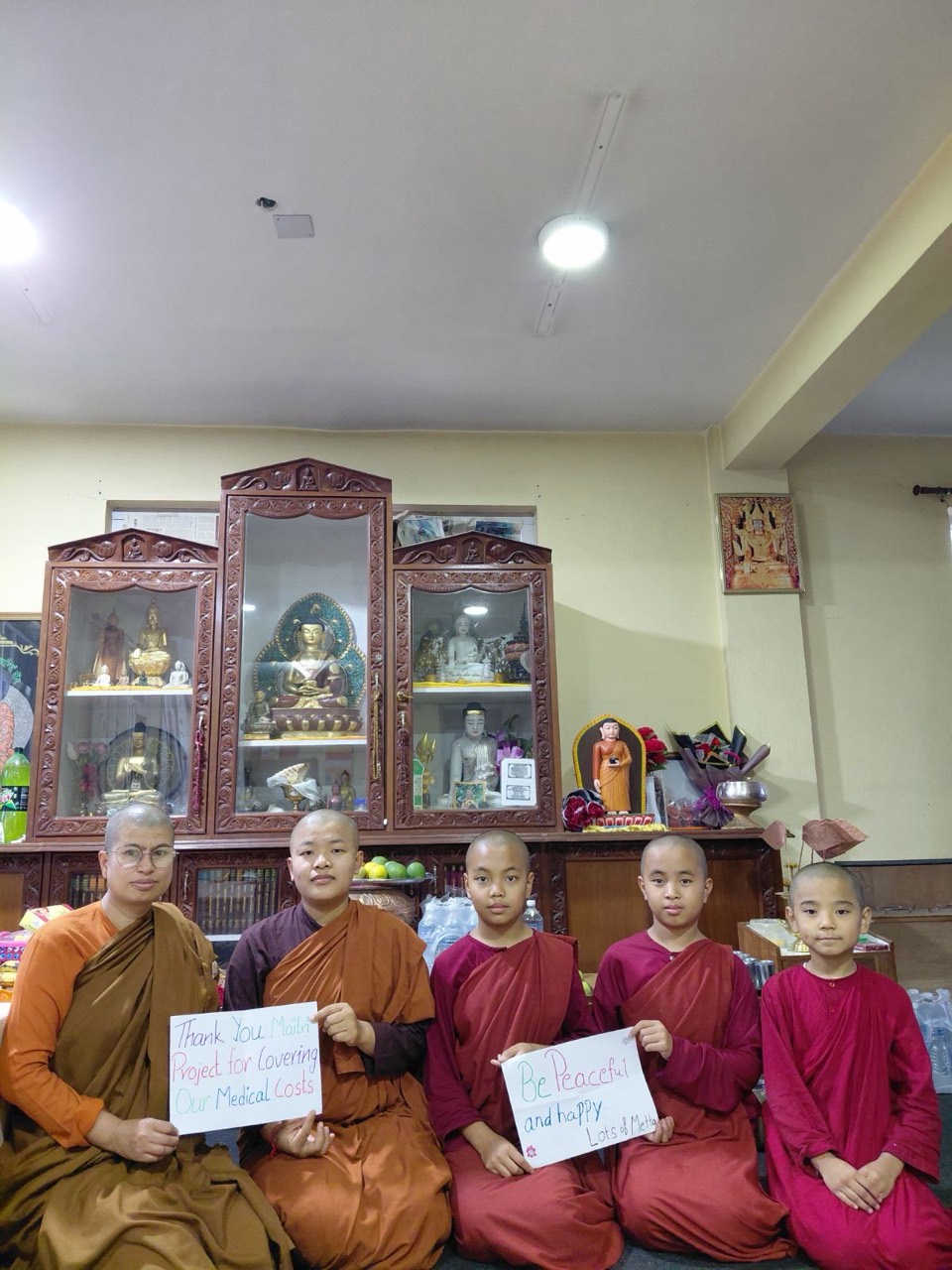 Five monastics sharing thank-you messages after medical-cost support