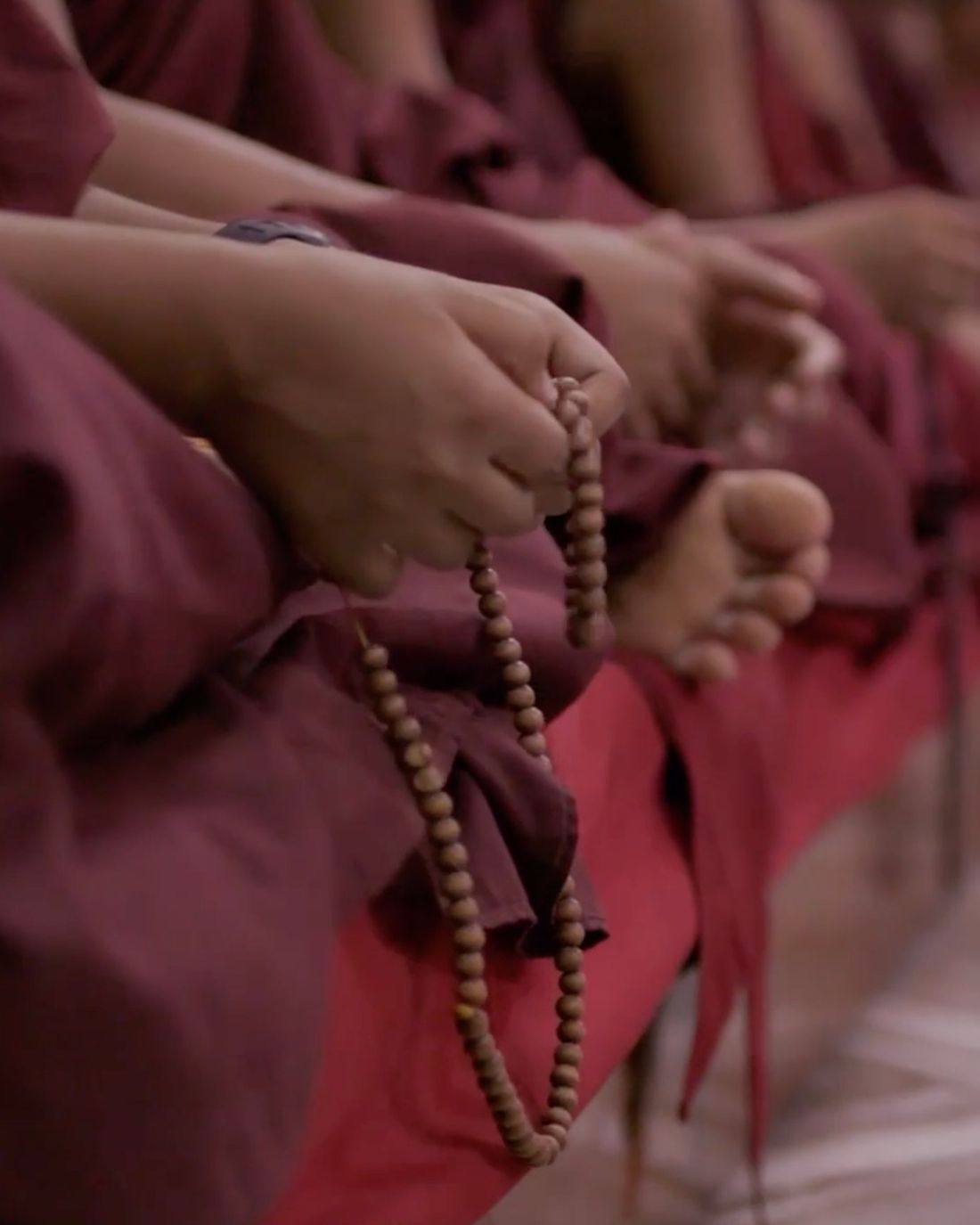 A young monk in the courtyard