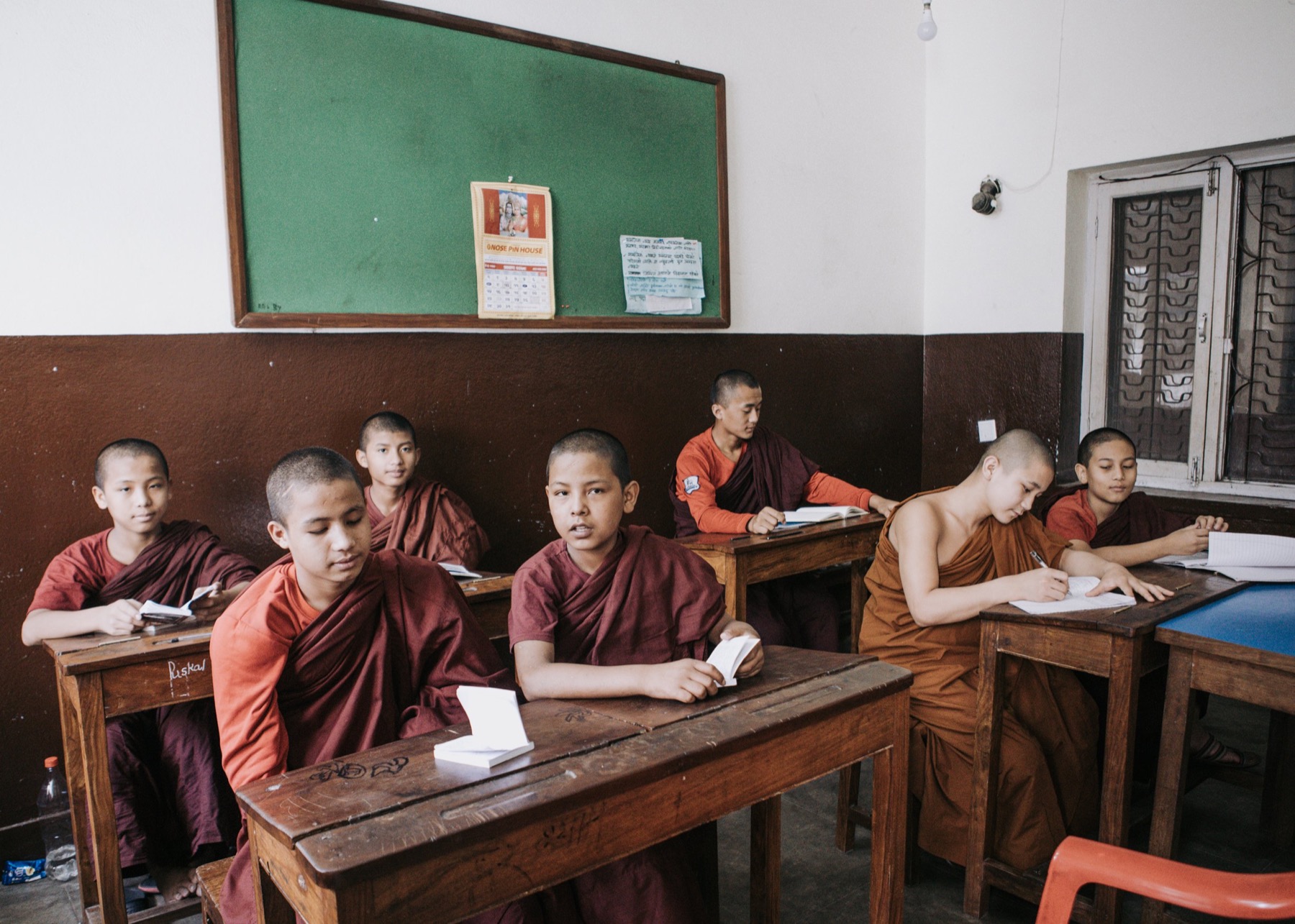 Young monastics studying together
